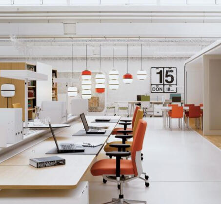 long desk with chairs clean office showing example of clean commercial office space